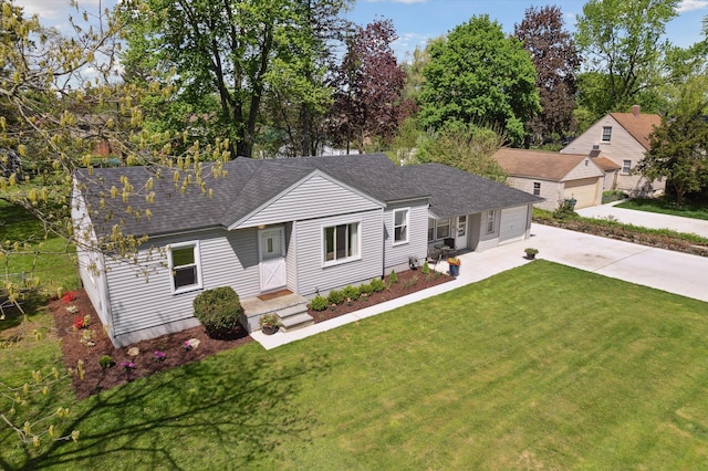 11389 Gold Arbor Rd, Plymouth, MI 48170 - view of front of house with roof with shingles, a front yard, driveway, and a garage