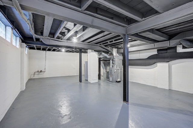 basement featuring heating unit
