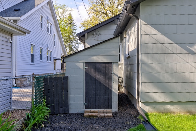 view of home's exterior featuring fence