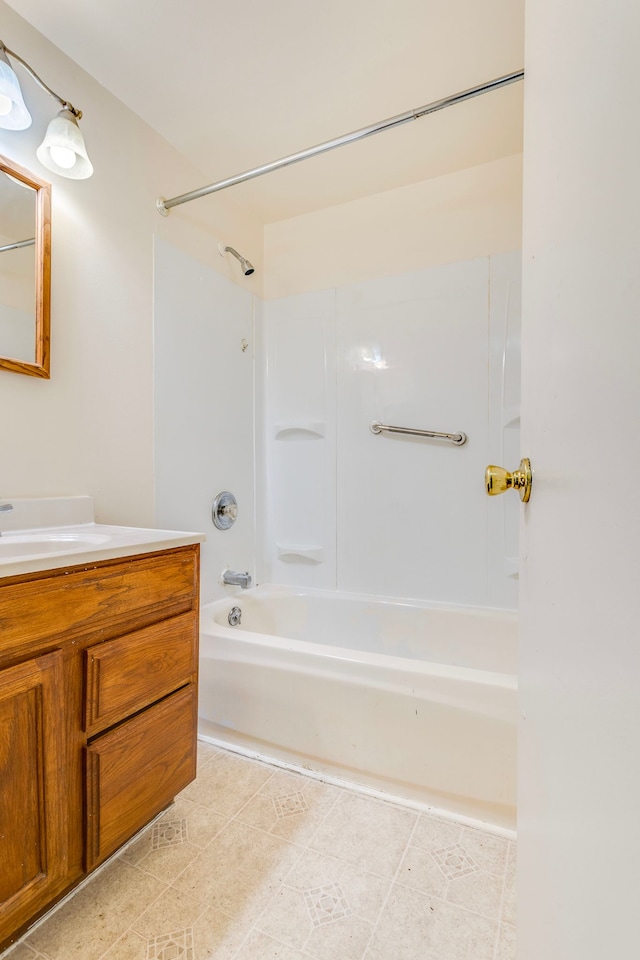full bath featuring shower / tub combination, vanity, and tile patterned floors