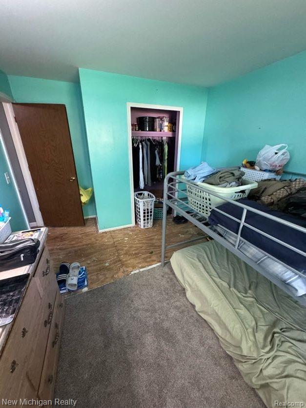 212 Sunnybrooke Dr, Vernon, MI 48476 - bedroom with a closet