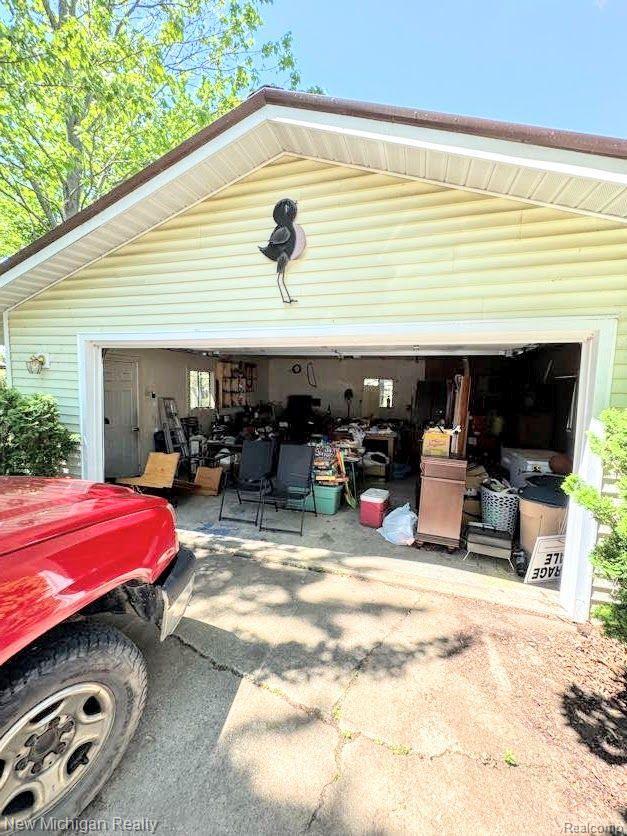 212 Sunnybrooke Dr, Vernon, MI 48476 - view of garage