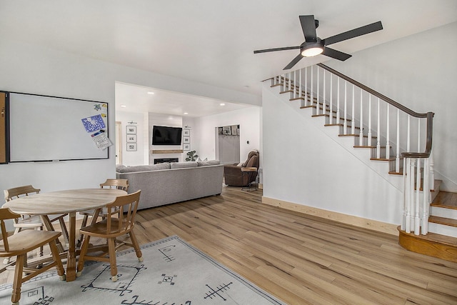 315 E Main St, Hart, MI 49420 - dining room featuring light wood-style floors, baseboards, and stairs