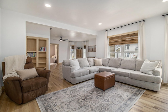 315 E Main St, Hart, MI 49420 - living room featuring ceiling fan, recessed lighting, plenty of natural light, and light wood-style floors