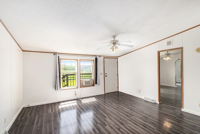 unfurnished room with ceiling fan, visible vents, and ornamental molding