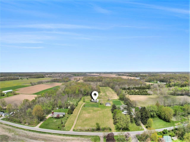 birds eye view of property featuring a rural view