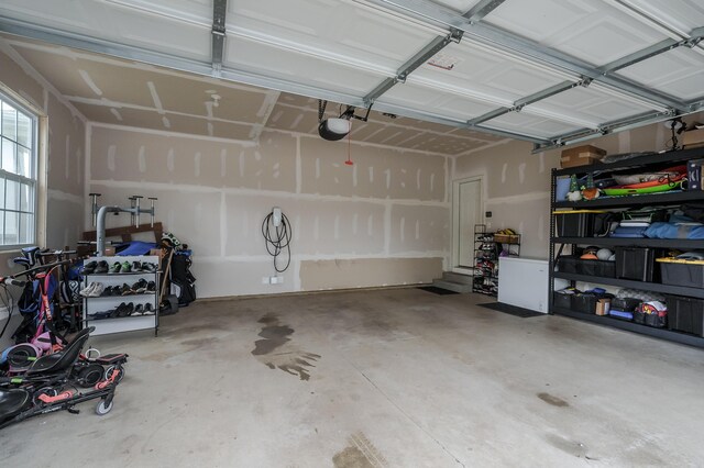 5849 Gavin Ln, Kalamazoo, MI 49009 - garage with a garage door opener