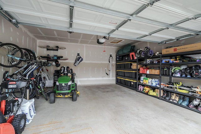 5849 Gavin Ln, Kalamazoo, MI 49009 - garage with a garage door opener