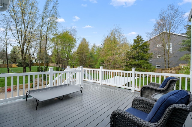 5849 Gavin Ln, Kalamazoo, MI 49009 - deck featuring fence and a lawn