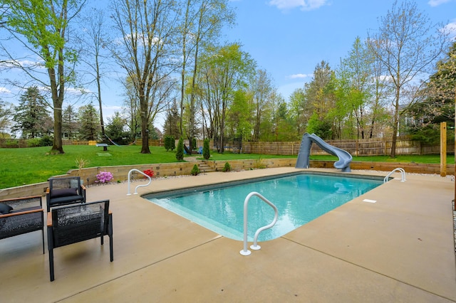 5849 Gavin Ln, Kalamazoo, MI 49009 - view of swimming pool with a patio area, a water slide, a fenced in pool, and a fenced backyard