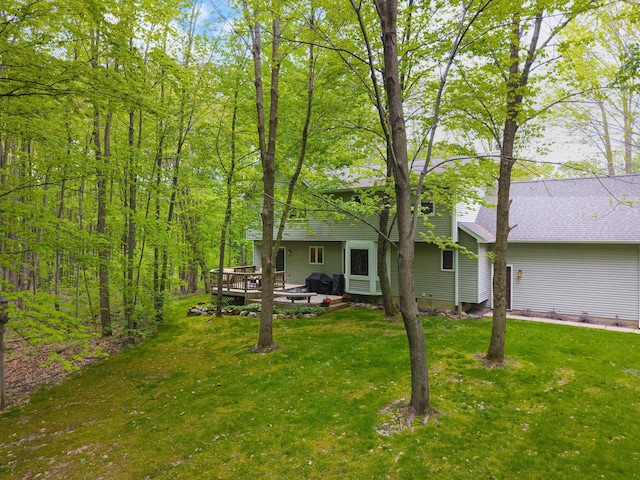 4217 Phillips Rd, Metamora, MI 48455 - view of grassy yard featuring a deck