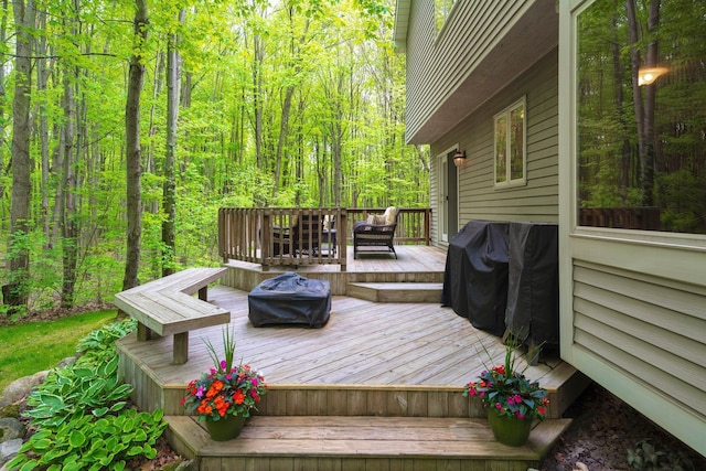 4217 Phillips Rd, Metamora, MI 48455 - wooden terrace with a forest view and area for grilling