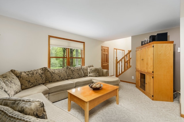 4217 Phillips Rd, Metamora, MI 48455 - living room featuring stairway, light colored carpet, and baseboards