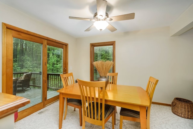 4217 Phillips Rd, Metamora, MI 48455 - dining area with plenty of natural light, ceiling fan, light carpet, and baseboards