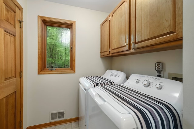 4217 Phillips Rd, Metamora, MI 48455 - laundry area with independent washer and dryer, cabinet space, and baseboards