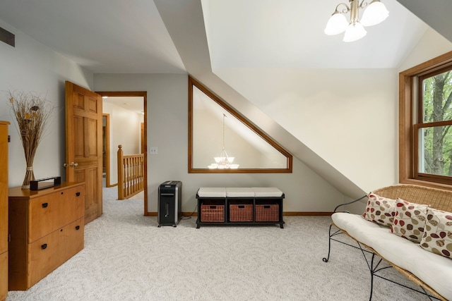 4217 Phillips Rd, Metamora, MI 48455 - sitting room with a chandelier, carpet flooring, vaulted ceiling, an upstairs landing, and baseboards