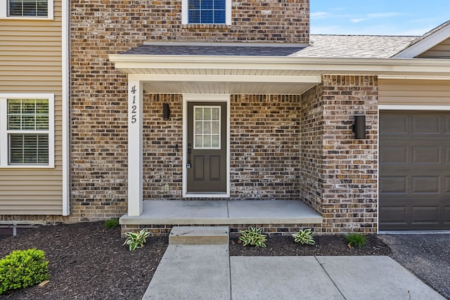 4125 Newton Rd, Commerce Twp, MI 48390 - doorway to property featuring a shingled roof, brick siding, an attached garage, and a porch
