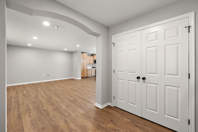 4125 Newton Rd, Commerce Twp, MI 48390 - foyer entrance featuring baseboards, wood finished floors, and recessed lighting