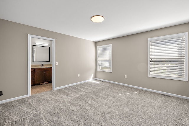 4125 Newton Rd, Commerce Twp, MI 48390 - unfurnished room with a sink, light carpet, and baseboards