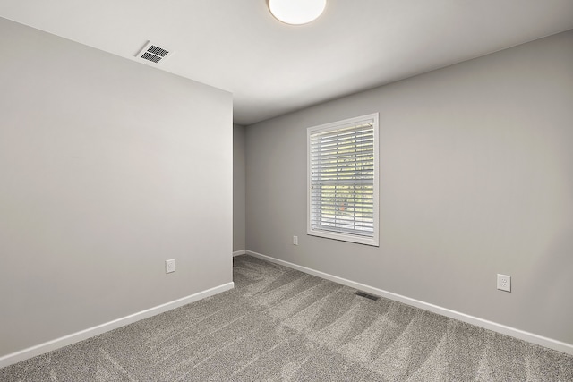 4125 Newton Rd, Commerce Twp, MI 48390 - spare room featuring baseboards and carpet