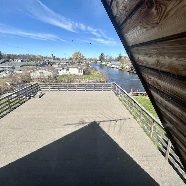8874 W Houghton Lake Dr, Houghton Lake, MI 48629 - view of patio with a water view