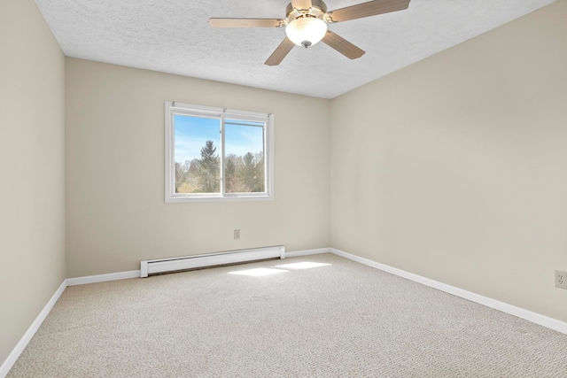2703 Green Meadows Dr, Traverse City, MI 49685 - carpeted empty room featuring baseboard heating, baseboards, a textured ceiling, and a ceiling fan