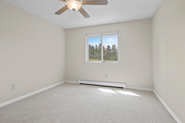 2703 Green Meadows Dr, Traverse City, MI 49685 - unfurnished room featuring a baseboard heating unit, carpet, a textured ceiling, baseboards, and a ceiling fan