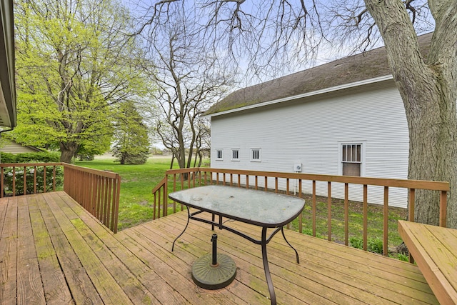 deck featuring a lawn
