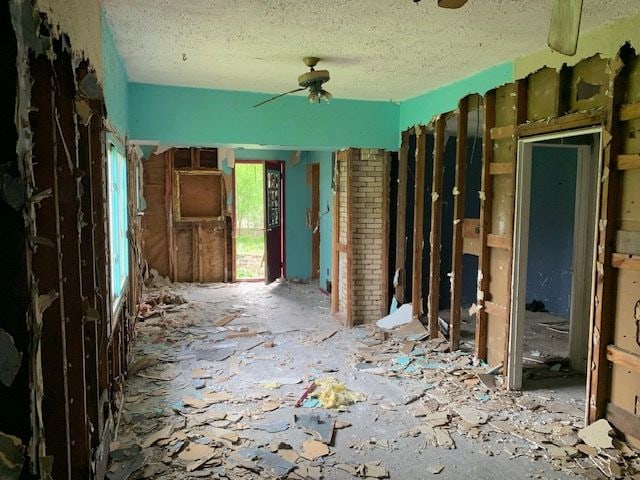 misc room with a textured ceiling