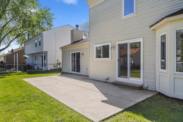 back of house featuring a patio