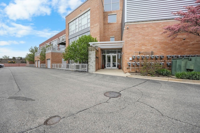 view of building exterior with fence