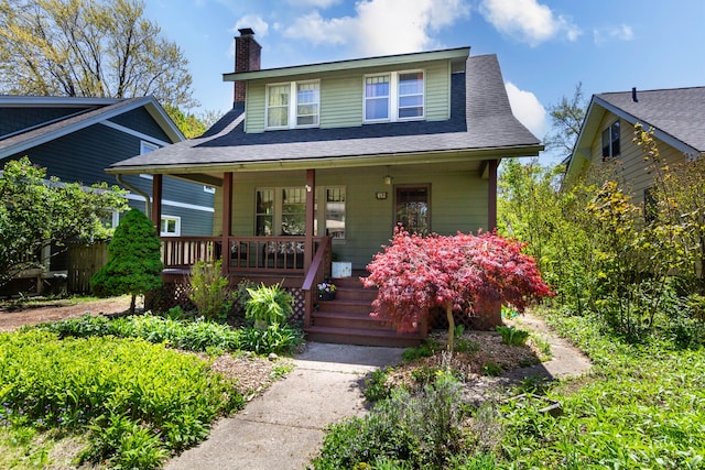 320 E Farnum Ave, Royal Oak, MI 48067 - bungalow featuring covered porch, a chimney, and a shingled roof