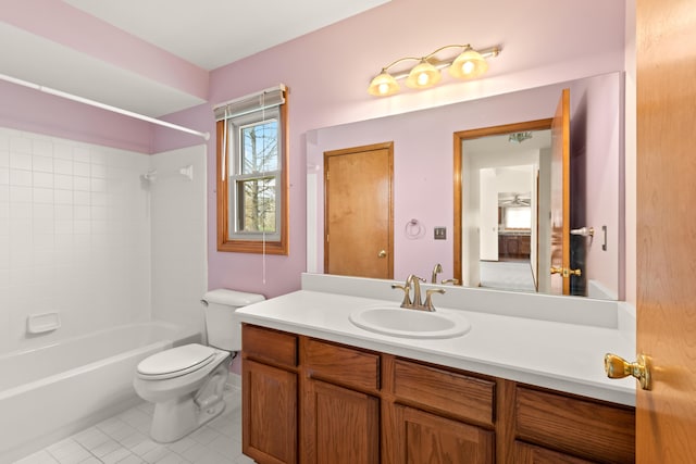 full bath featuring shower / bath combination, vanity, toilet, and tile patterned floors