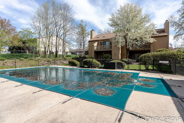 community pool with fence