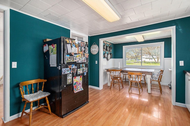 dining area with wood finished floors