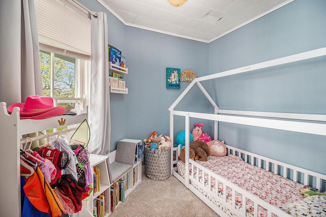 bedroom featuring carpet flooring and ornamental molding