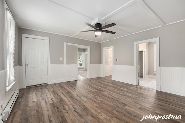 1108/1110 Muskegon Ave NW, Grand Rapids, MI 49504 - interior space featuring wainscoting, ensuite bath, dark wood-style floors, and a baseboard heating unit