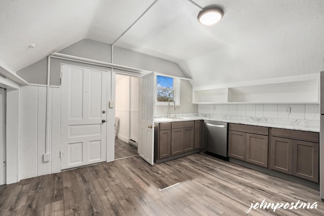 1108/1110 Muskegon Ave NW, Grand Rapids, MI 49504 - kitchen featuring open shelves, stainless steel dishwasher, vaulted ceiling, and a sink
