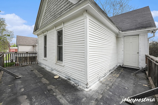 1108/1110 Muskegon Ave NW, Grand Rapids, MI 49504 - view of side of property with a shingled roof