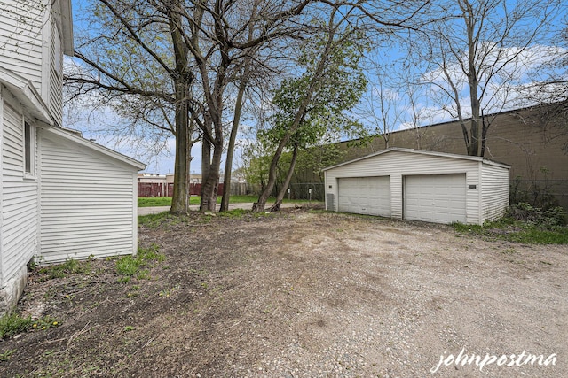 1108/1110 Muskegon Ave NW, Grand Rapids, MI 49504 - view of yard with an outdoor structure and a detached garage