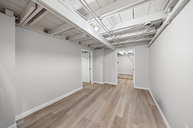 91 S Josephine Ave, Waterford, MI 48328 - finished below grade area featuring light wood-type flooring and baseboards