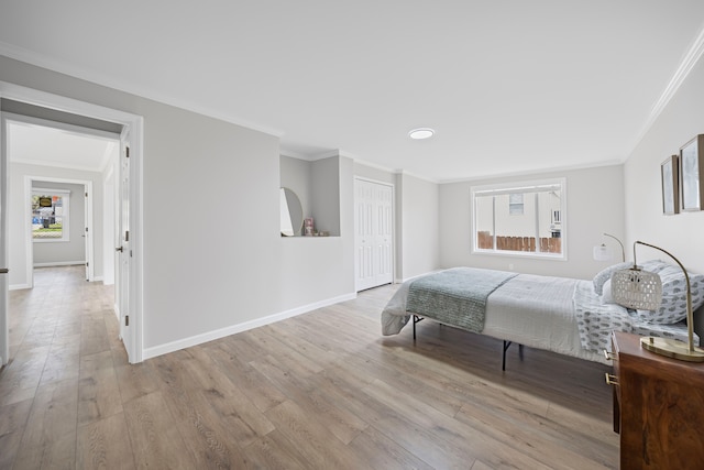 91 S Josephine Ave, Waterford, MI 48328 - bedroom with ornamental molding, wood finished floors, baseboards, and a closet