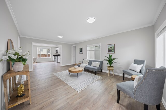 91 S Josephine Ave, Waterford, MI 48328 - living area featuring ornamental molding, light wood finished floors, and baseboards