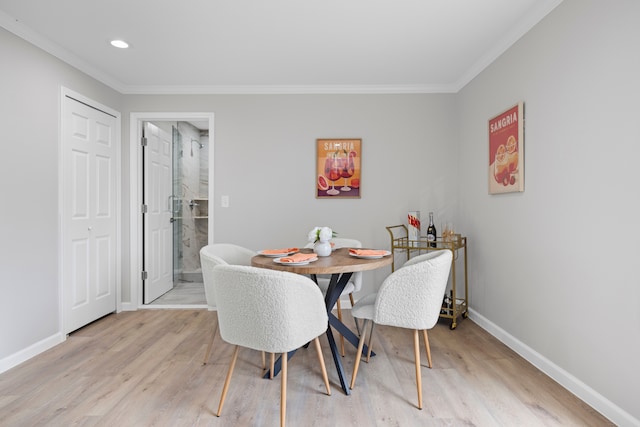 91 S Josephine Ave, Waterford, MI 48328 - dining area with light wood-style floors, ornamental molding, baseboards, and recessed lighting
