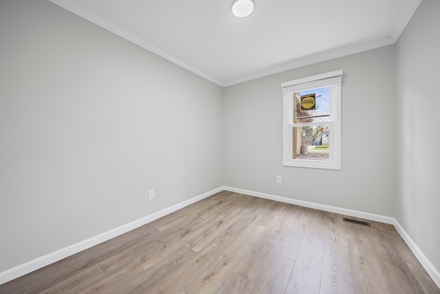 91 S Josephine Ave, Waterford, MI 48328 - spare room featuring wood finished floors, baseboards, and ornamental molding