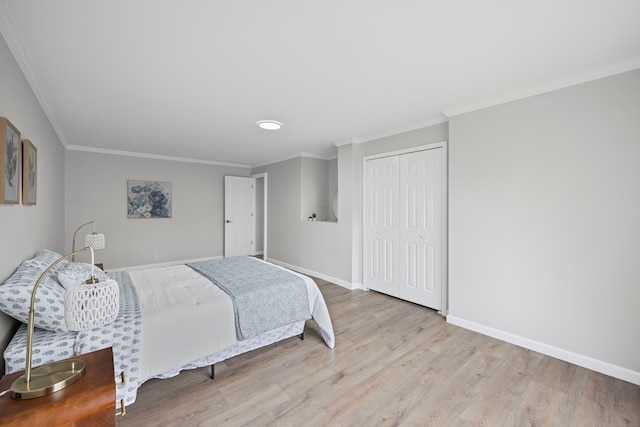91 S Josephine Ave, Waterford, MI 48328 - bedroom with wood finished floors, baseboards, ornamental molding, and a closet
