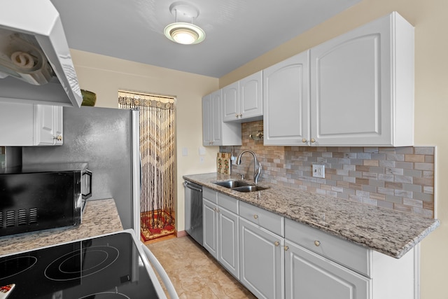 kitchen with a sink, range with electric cooktop, stainless steel dishwasher, under cabinet range hood, and tasteful backsplash