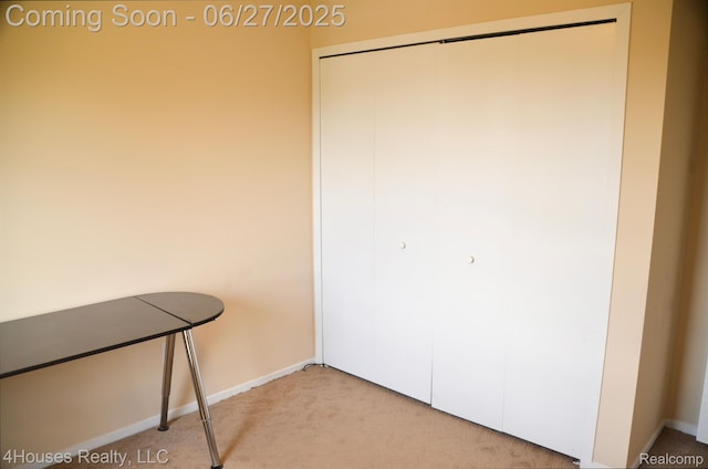 4184 Colorado Ln Unit 117, West Bloomfield, MI 48322 - unfurnished bedroom featuring light carpet and a closet