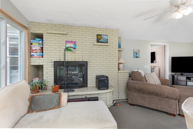 6171 S Main St, Clarkston, MI 48346 - carpeted living area with a brick fireplace and a ceiling fan