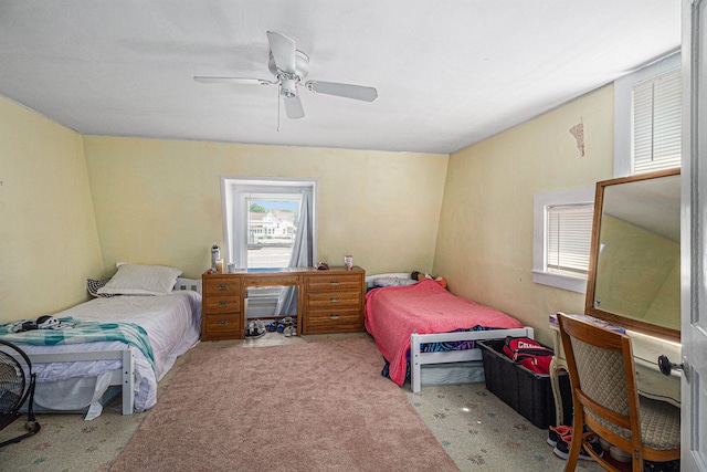 carpeted bedroom featuring ceiling fan